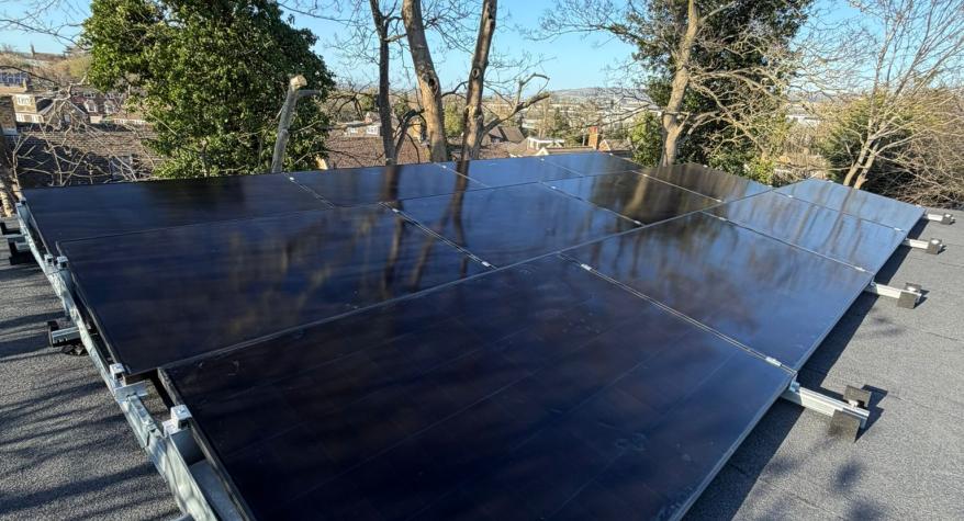12 Flat Roof Mounted Solar Panels with Hybrid Inverter and 10Kwh of Battery storage